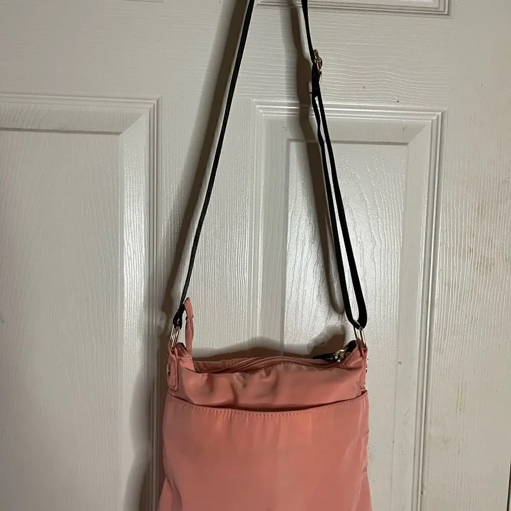 Steve Madden peach quilted nylon front zipper pocket shoulder/crossbody bag.